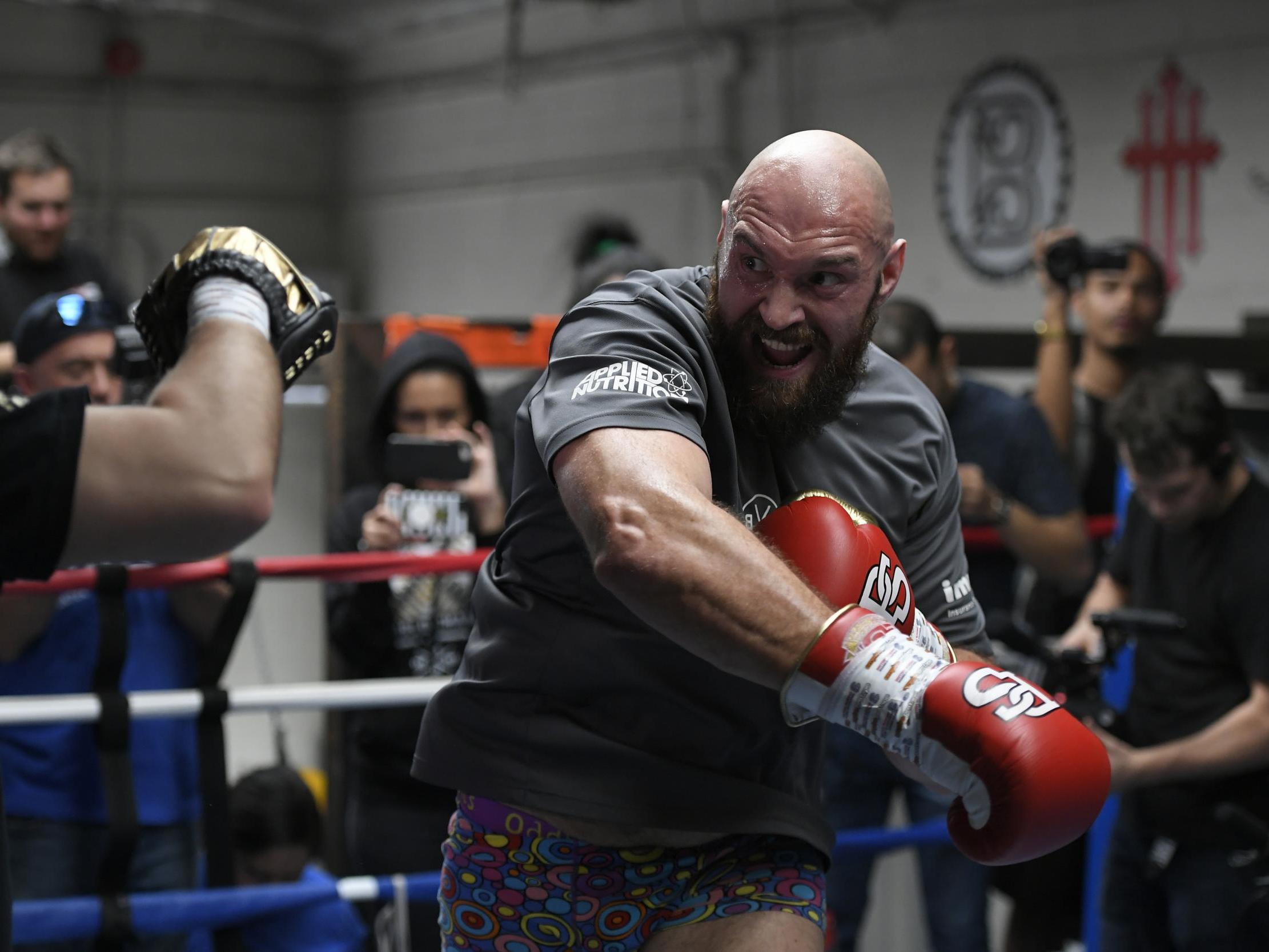 Trainer Ben Davison spars with lineal heavyweight champion Tyson Fury