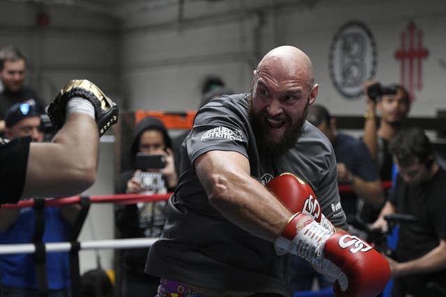 Trainer Ben Davison spars with lineal heavyweight champion Tyson Fury