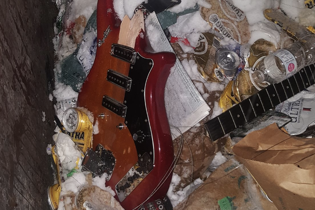 Canadian metal band Witchrot announced it would be taking an indefinite hiatus and shared this photo of a broken electric guitar in a pile of trash.