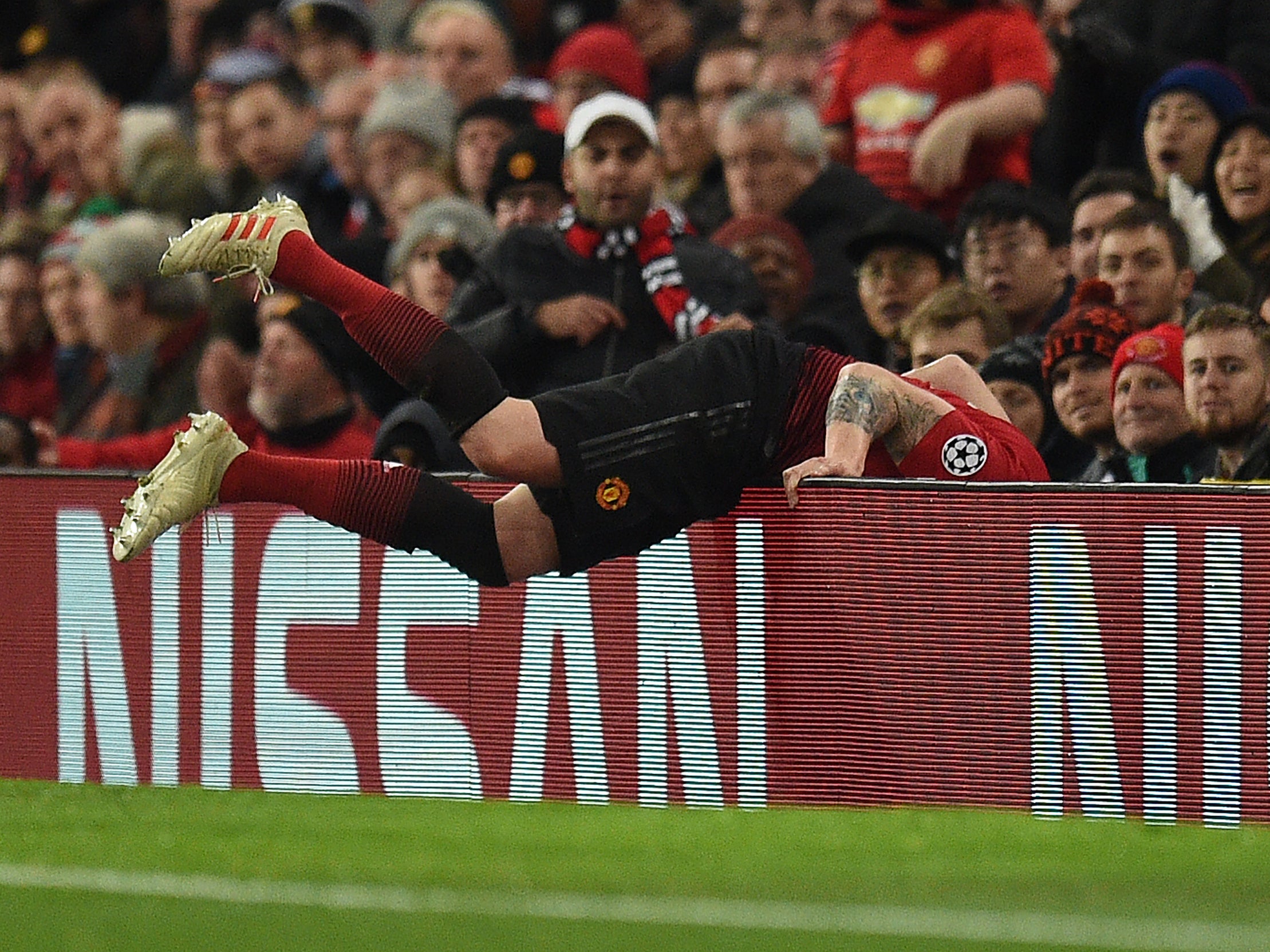 Phil Jones takes a tumble during the first half