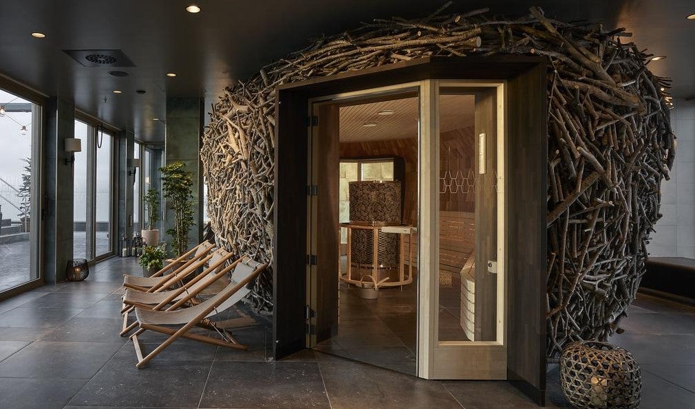 Comprising twigs and sticks, Downtown Camper’s wellness lounge resembles a stylish birds’ nest