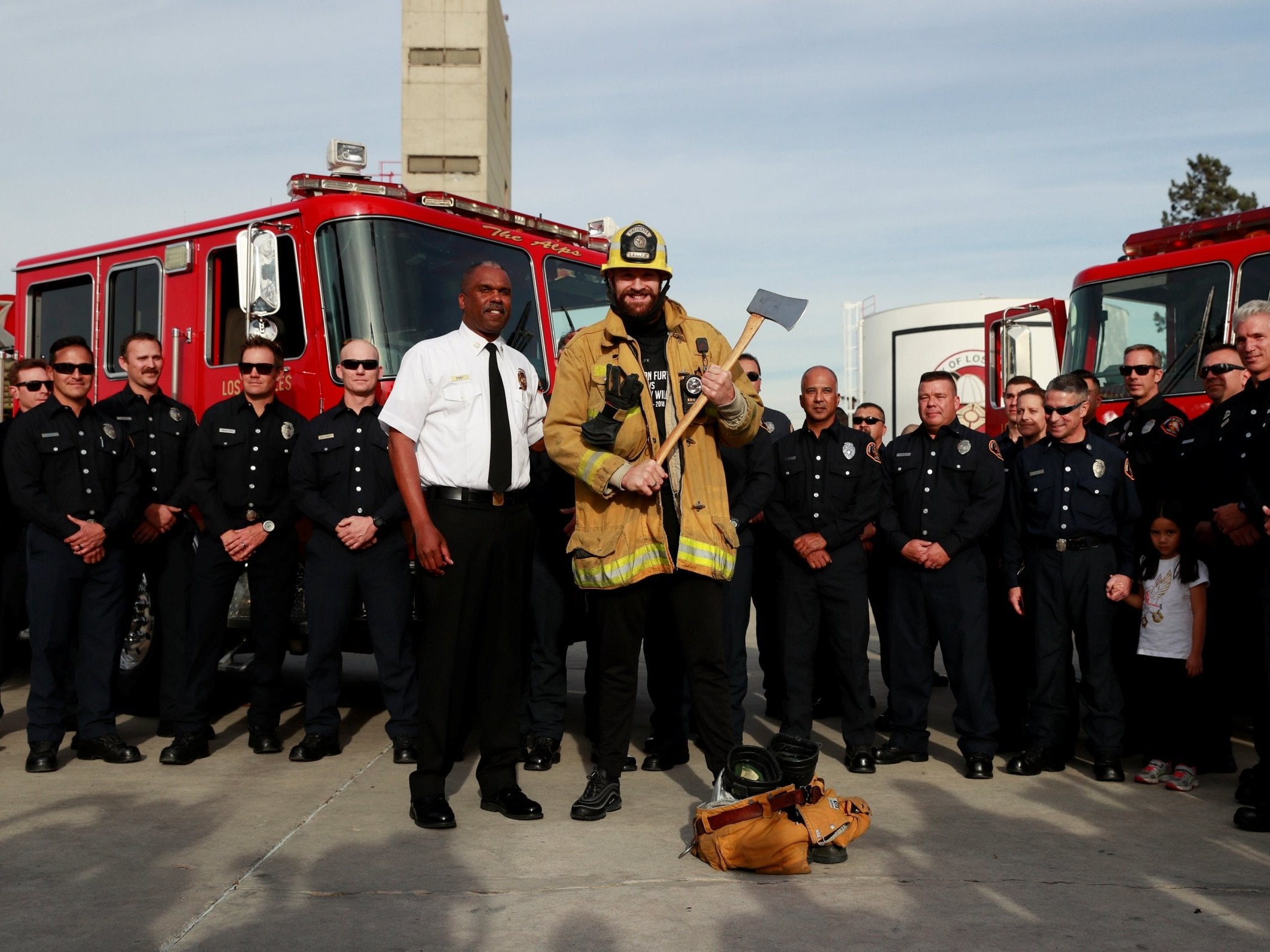 Fury presented tickets to a group of LA firefighters