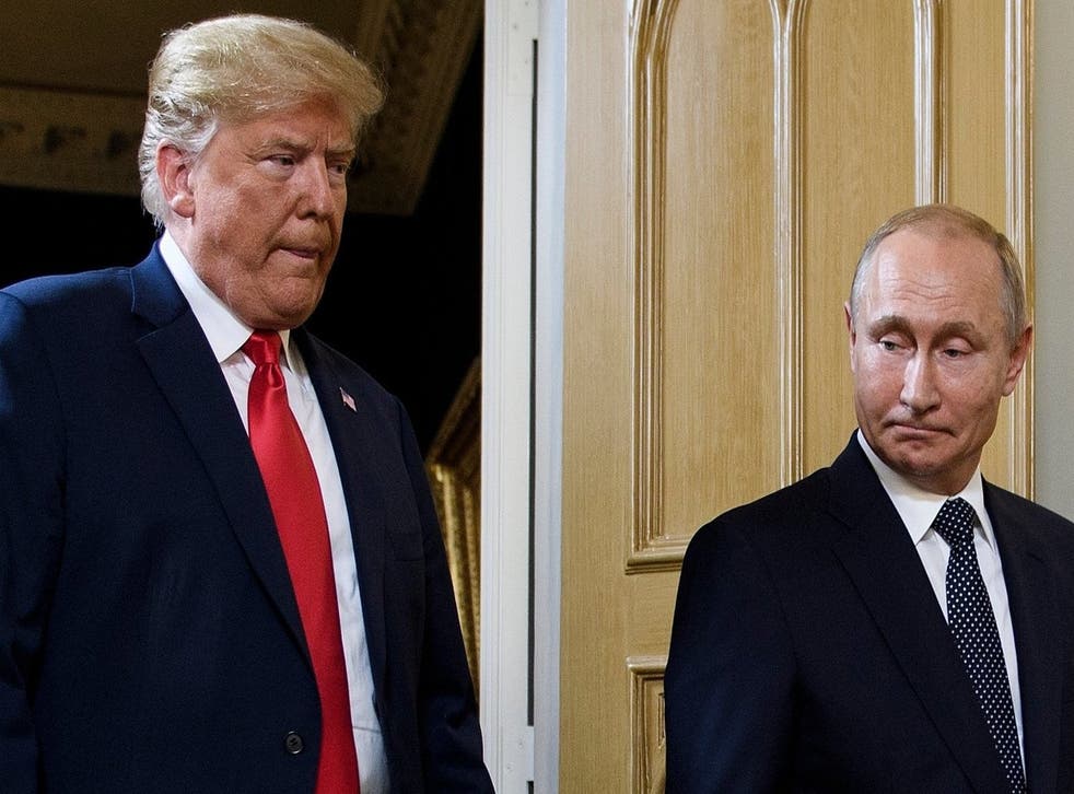 Donald Trump and Vladimir Putin arrive for a meeting in Helsinki in July 2018