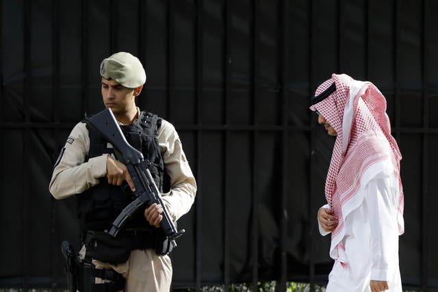 A border police officer guards the entrance to the Saudi embassy in Buenos Aires, Argentina