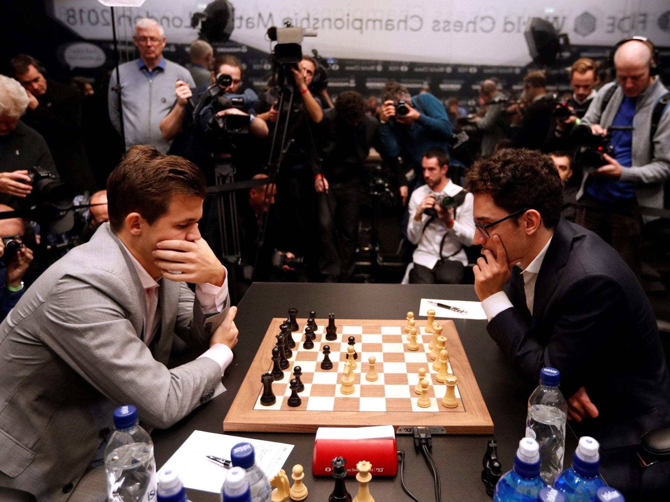 Magnus Carlsen turns tables on Fabiano Caruana in Game 3 draw – as it  happened, World Chess Championship 2018