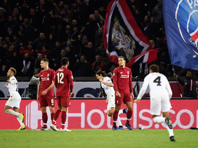 Liverpool's players look on after Neymar scored PSG's second goal of the night