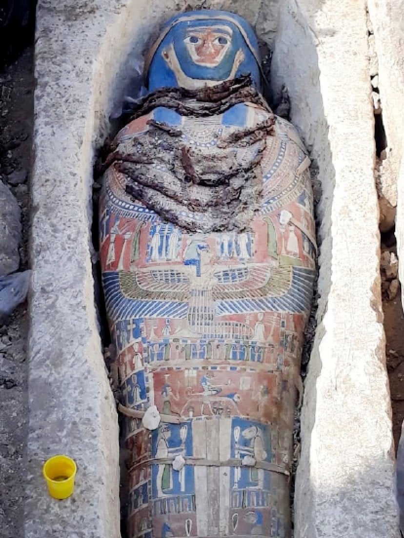 An ancient mummy covered with a layer of painted cartonnage, which was found inside a sarcophagus in an area of King Amenemhat II's pyramid in the Dashur royal necropolis