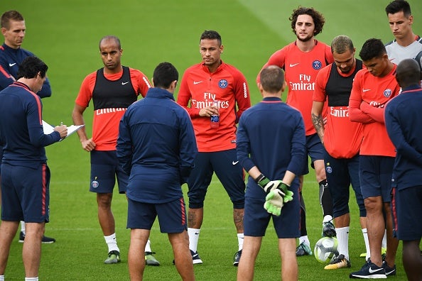 Neymar, centre, was disappointed with the exit of Lucas, left (Getty)