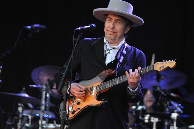 Bob Dylan performs on stage during the 21st edition of the Vieilles Charrues music festival on 22 July, 2012 in Carhaix-Plouguer, western France.