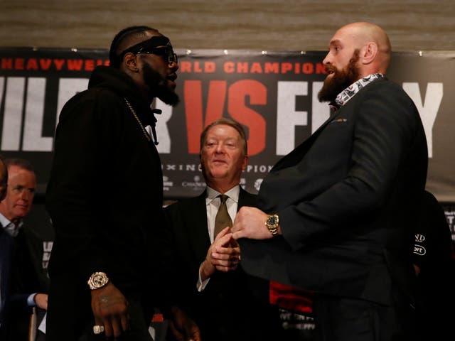 Deontay Wilder and Tyson Fury exchange words