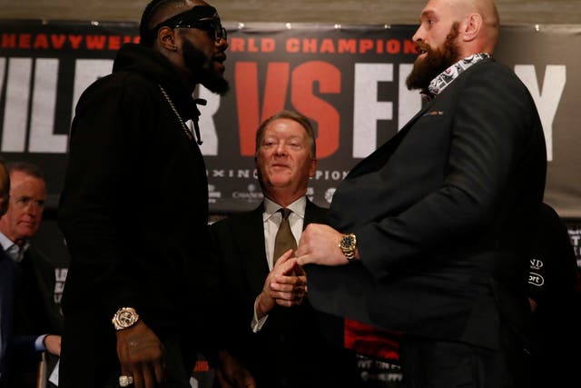 Deontay Wilder and Tyson Fury exchange words