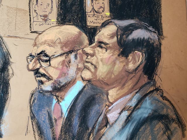 The accused Mexican drug lord Joaquin "El Chapo" Guzman (R), appears with defense attorney A. Eduardo Balarezo (L) during his trial
