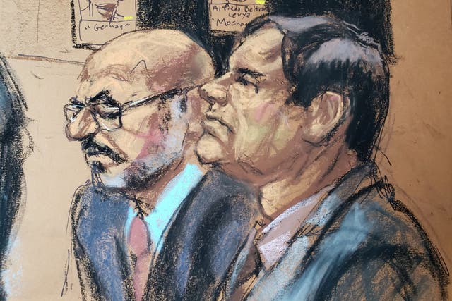 The accused Mexican drug lord Joaquin "El Chapo" Guzman (R), appears with defense attorney A. Eduardo Balarezo (L) during his trial