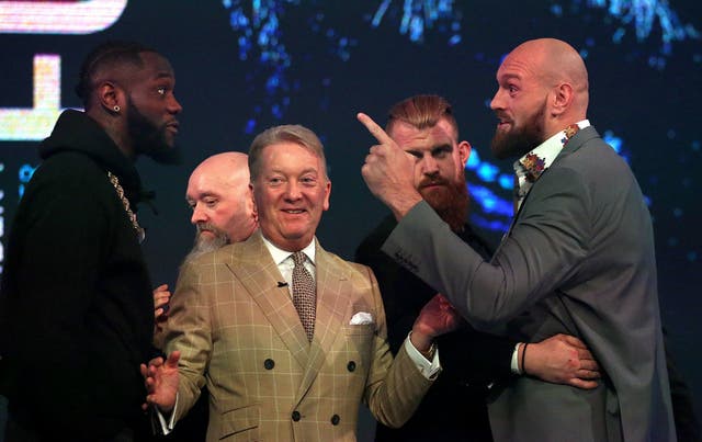 Tyson Fury squares up to Deontay Wilder at their final press conference