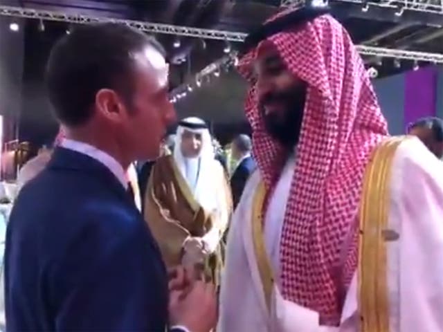 Emmanuel Macron can be seen looking the crown prince in the eye during the video as Muhammed bin Salman nods his head and smiles at times