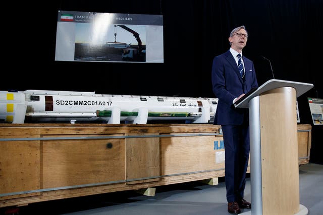 Brian Hook, the US special representative for Iran, stands in front of an Iranian missile.