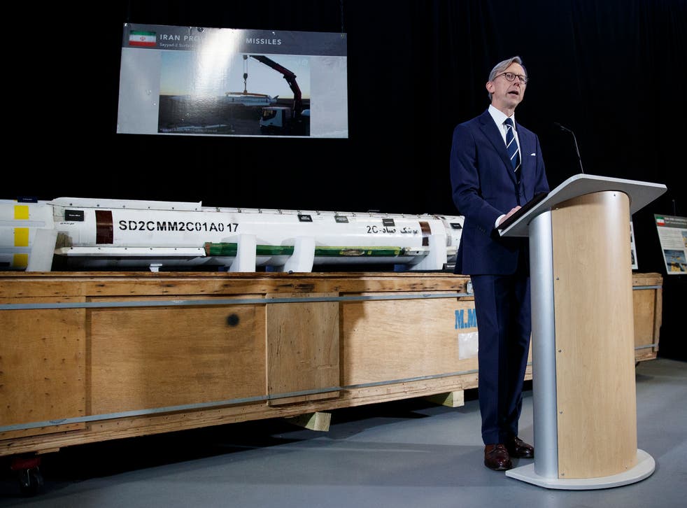 Brian Hook, the US special representative for Iran, stands in front of an Iranian missile.