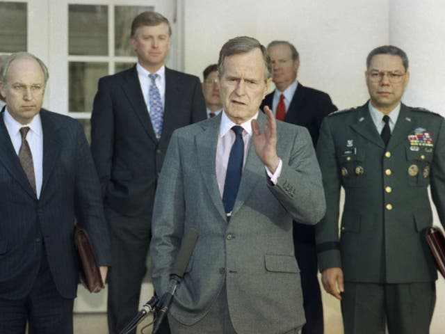 Then-President George HW Bush in the Rose Garden of the White House after meeting with top military advisors to discuss the Gulf War