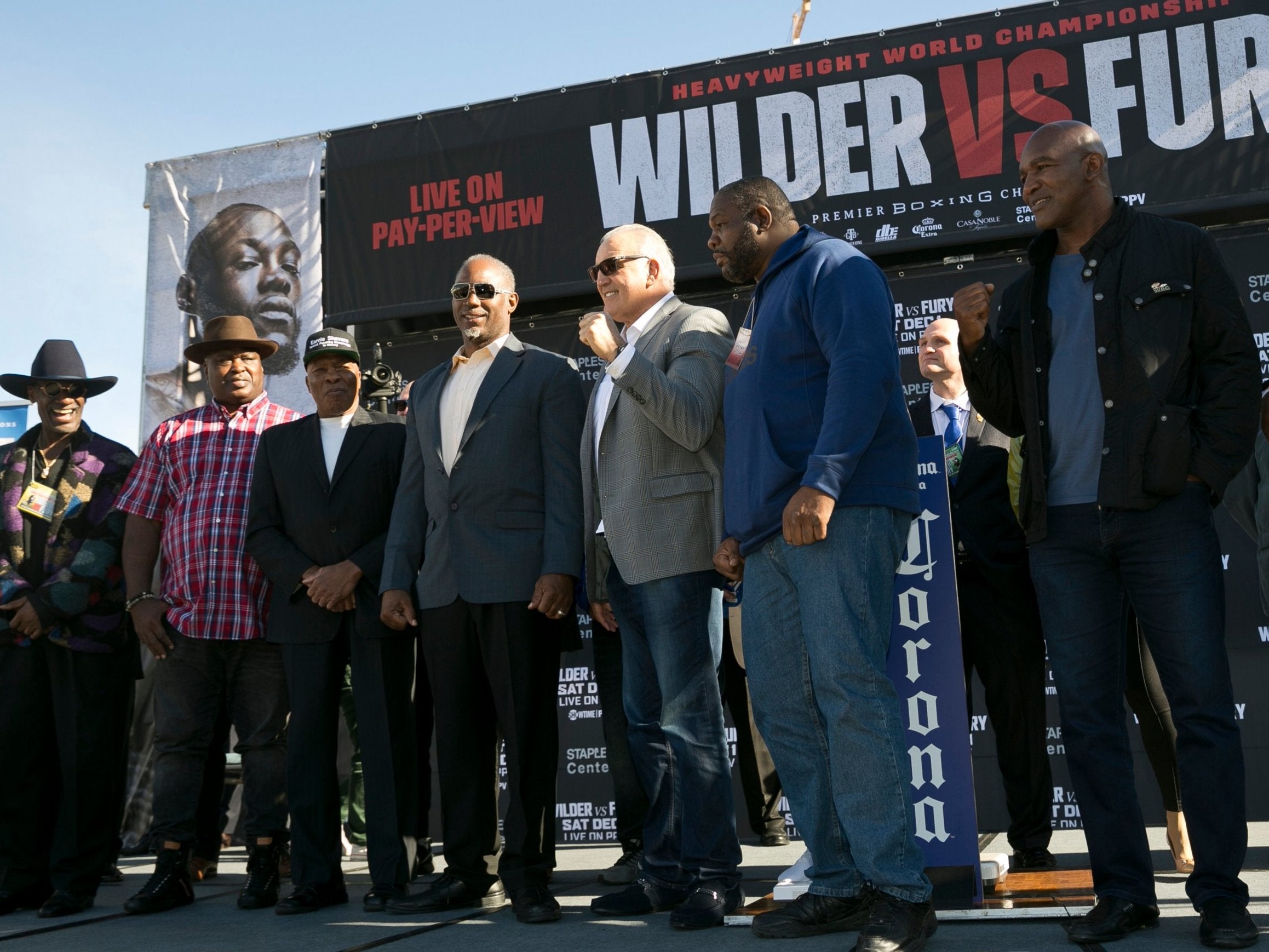 Former heavyweight world champions including Lennox Lewis (fourth-left) and Evander Holyfield (far right)