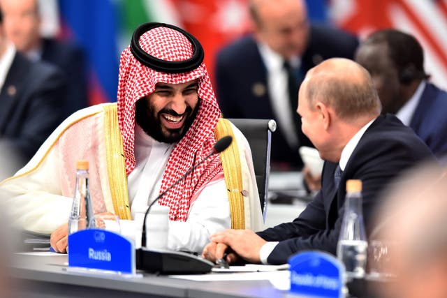 Crown Prince of Saudi Arabia Mohammed bin Salman al-Saud shares a laugh with Russian President Vladimir Putin