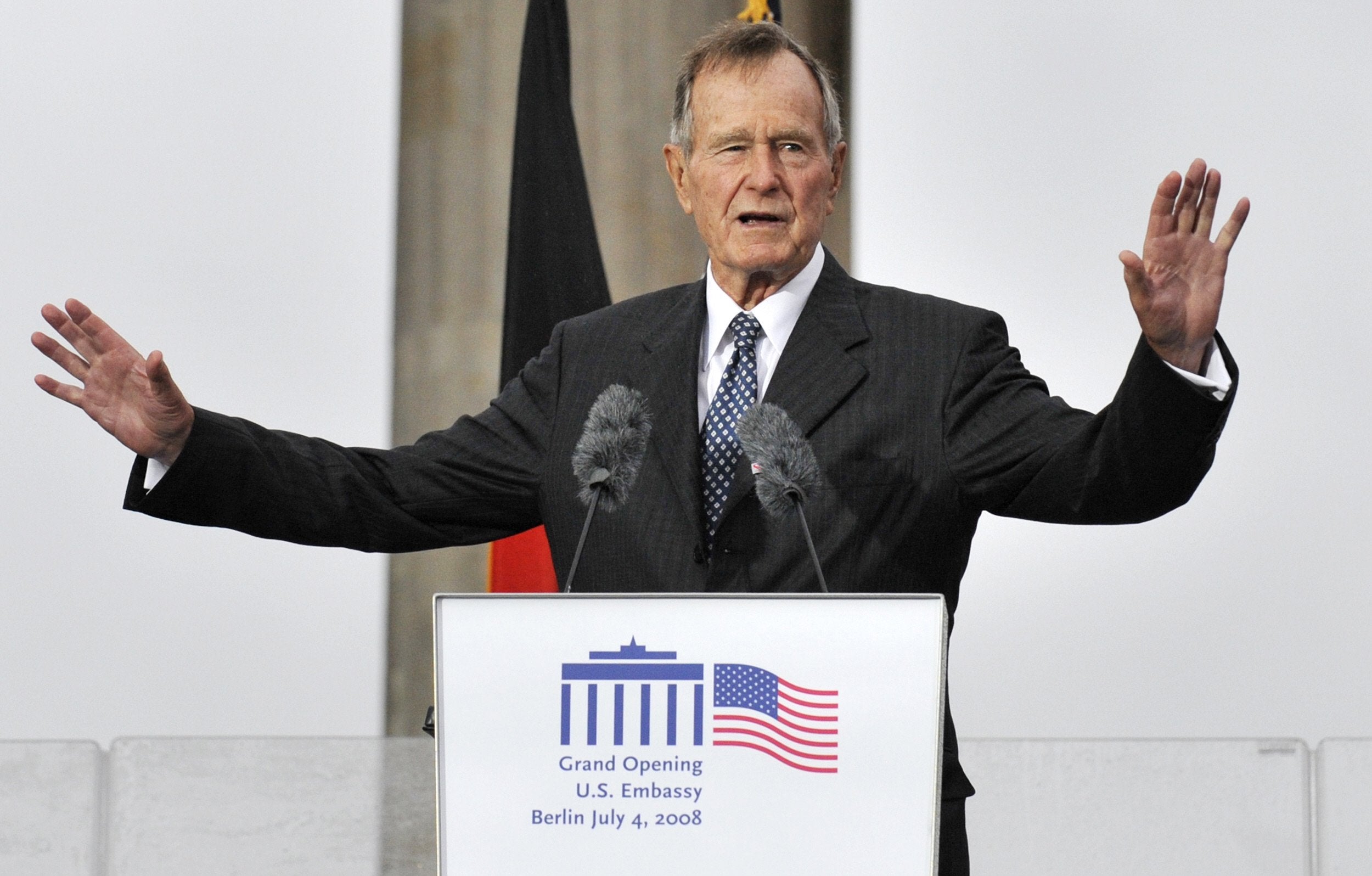Former US president George Bush addresses guests during a ceremony to inaugurate the new US embassy building in Berlin