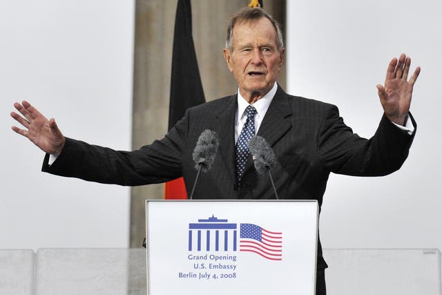 Former US president George Bush addresses guests during a ceremony to inaugurate the new US embassy building in Berlin