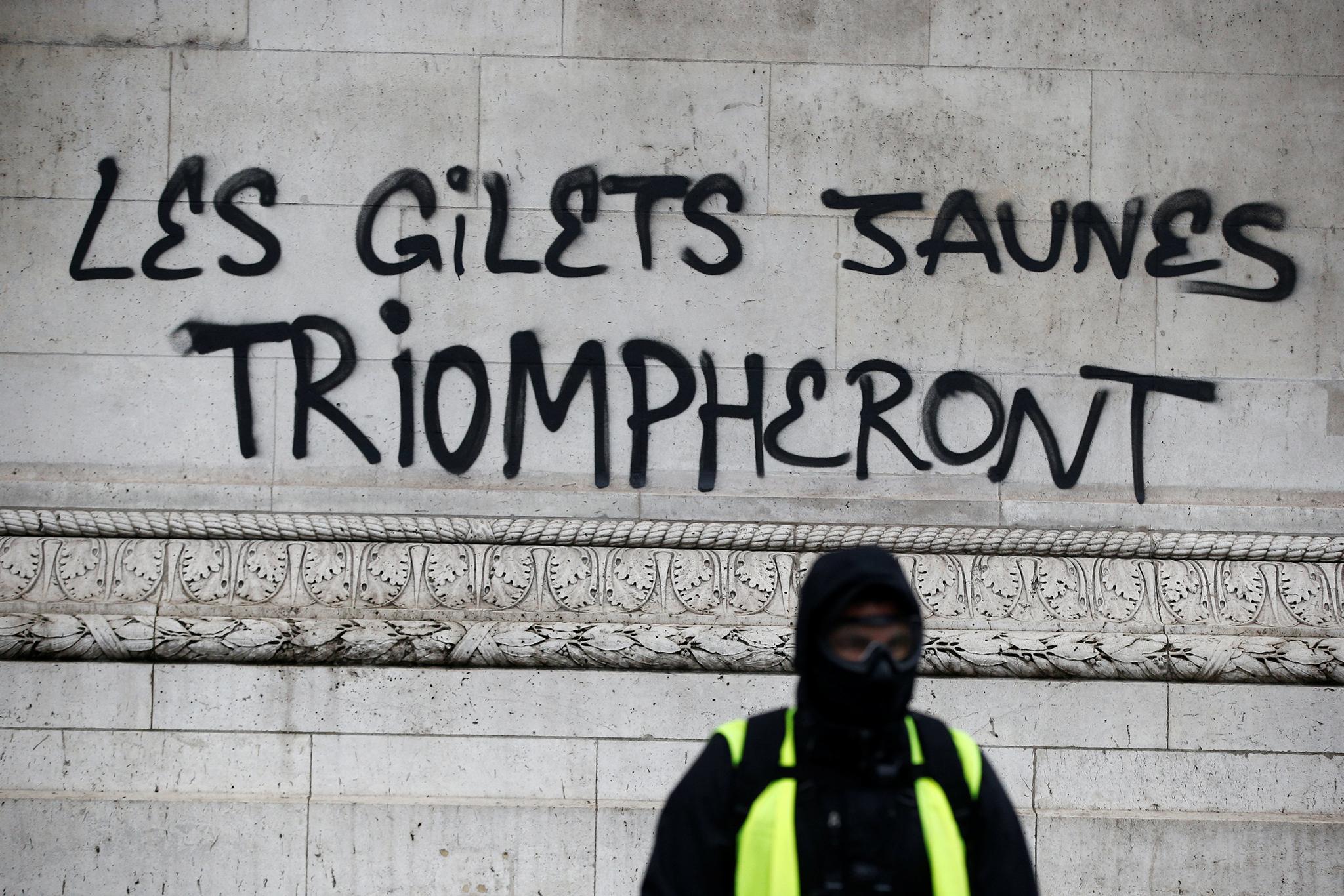 The yellow vests will triumph is scrawled across the Arc de?Triomphe