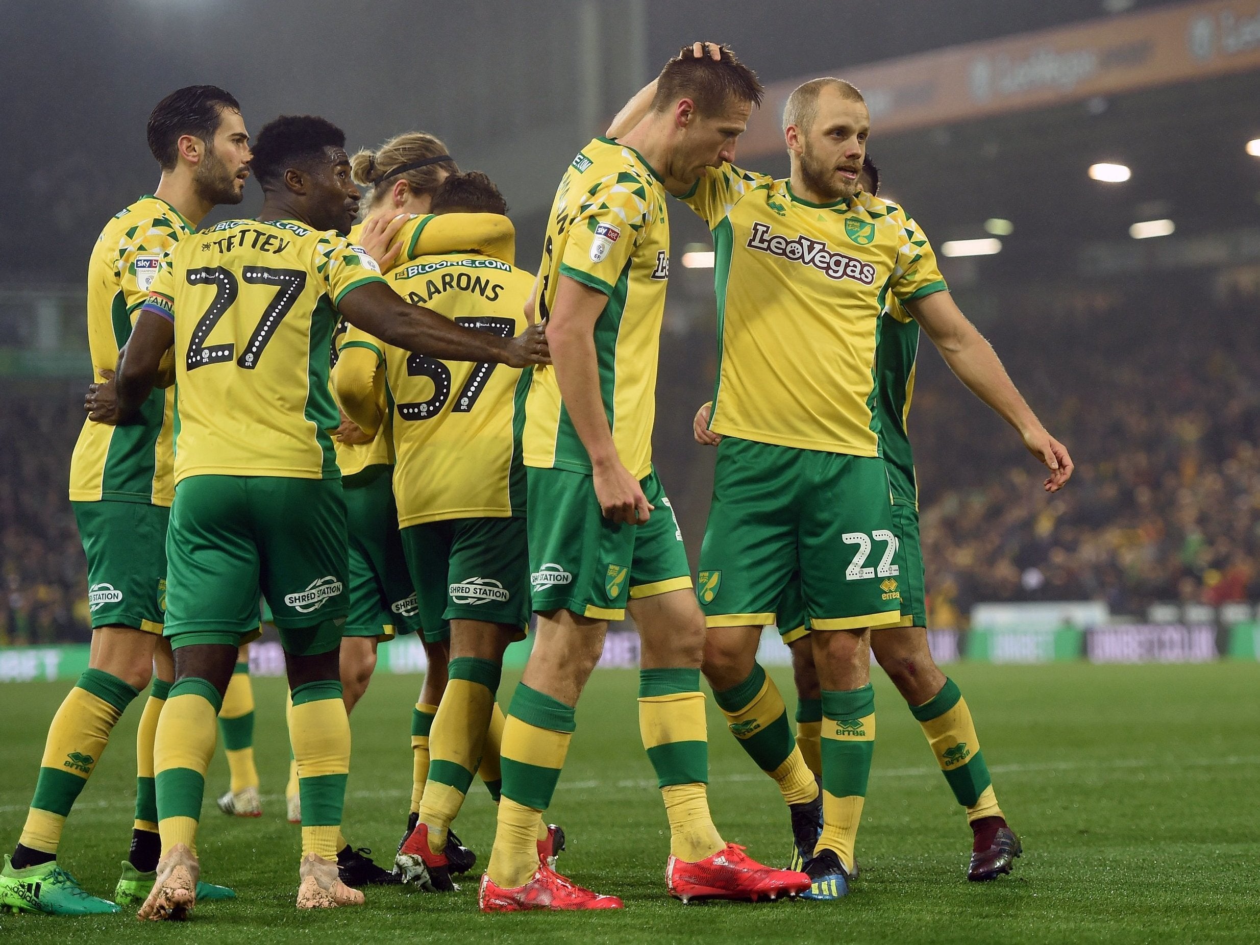 Norwich came from behind to beat Rotherham and stay at the top