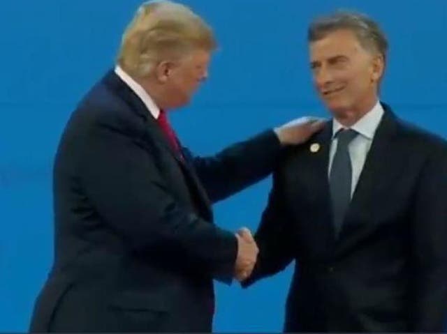 Donald Trump and Mauricio Macri shake hands at the G20 summit