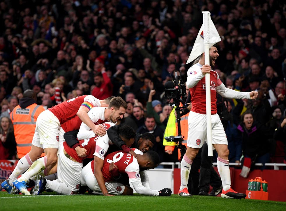 Arsenal's players celebrate after Lucas Torreira added the side's fourth of the afternoon