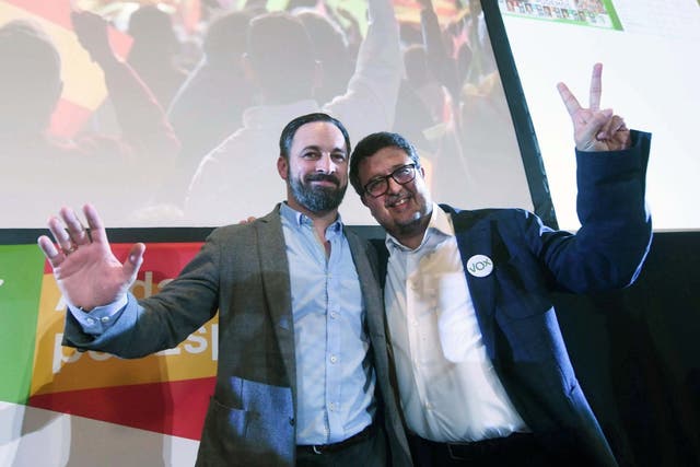 Vox's leader Santiago Abascal (left) and regional candidate Francisco Serrano (right)