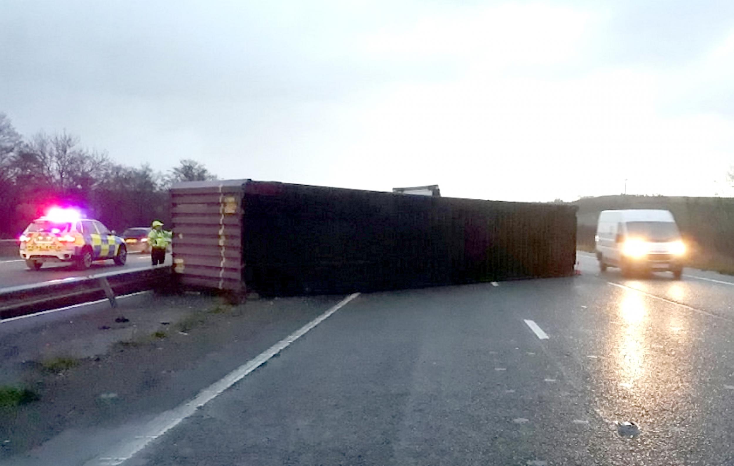 The first pictures of a lorry that crashed through the central reservation of the M4 have been released