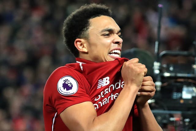 Trent Alexander-Arnold celebrates Liverpool's 1-0 victory in front of the Everton fans