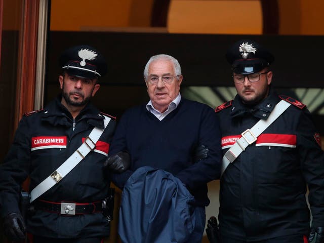 Settimino Mineo is escorted by Italian Carabinieri police after an anti Mafia operation