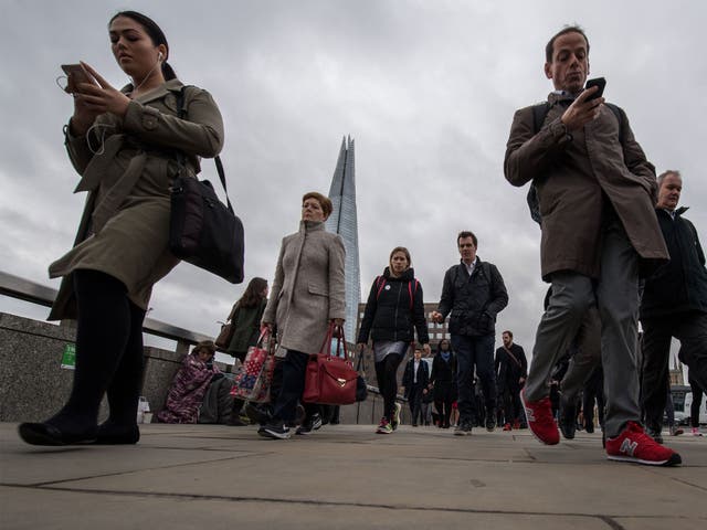 Pedestrians looking at mobile phones have caused hundreds of traffic accidents in the City of London since 2013