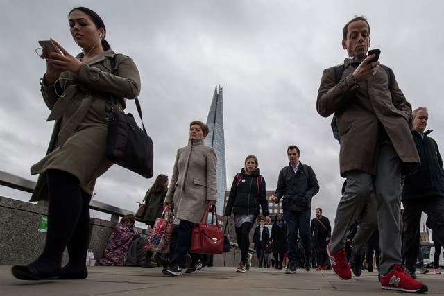 Pedestrians looking at mobile phones have caused hundreds of traffic accidents in the City of London since 2013