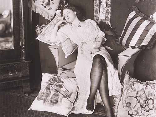Portrait of seated woman in Storyville, New Orleans, circa 1912