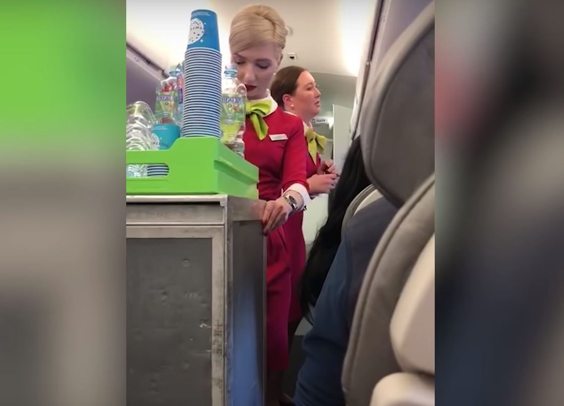 Flight attendants tried to calm overheating passengers down