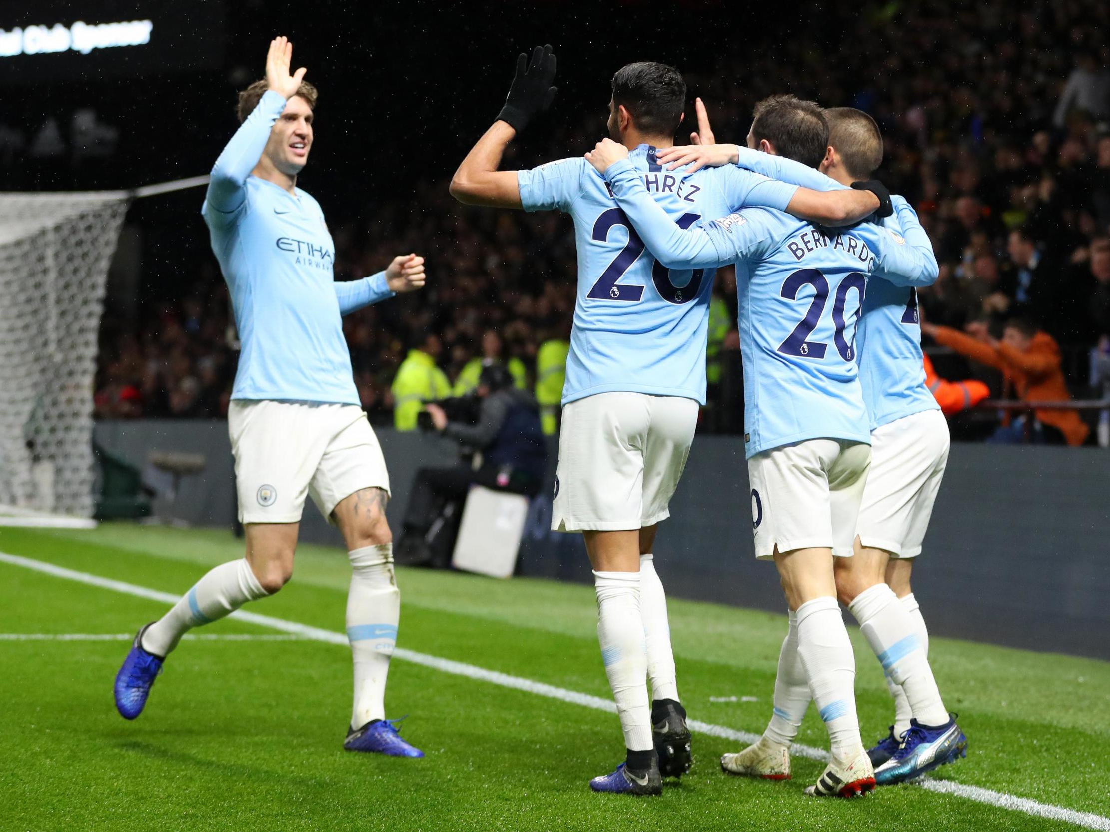 Manchester City's players celebrate their second goal of the evening