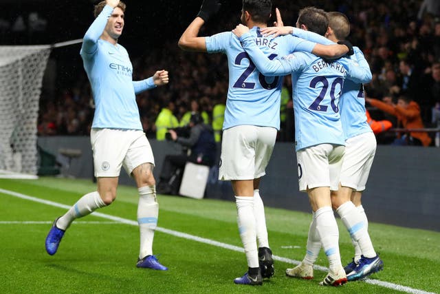 Manchester City's players celebrate their second goal of the evening