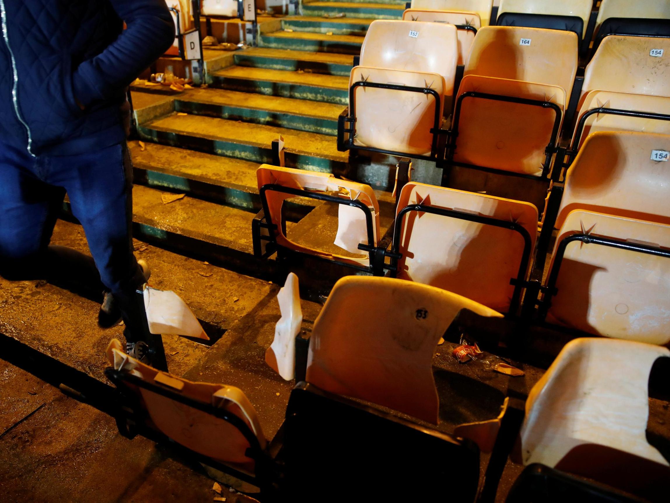 Seats were broken by fans in the stands