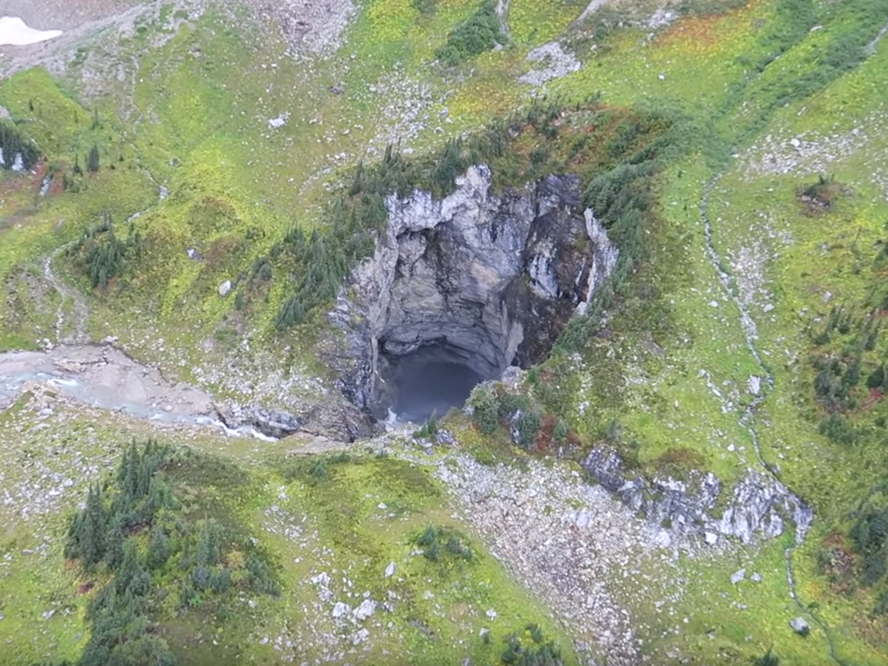 The enormous cave discovered in British Columbia seen from a helicopter