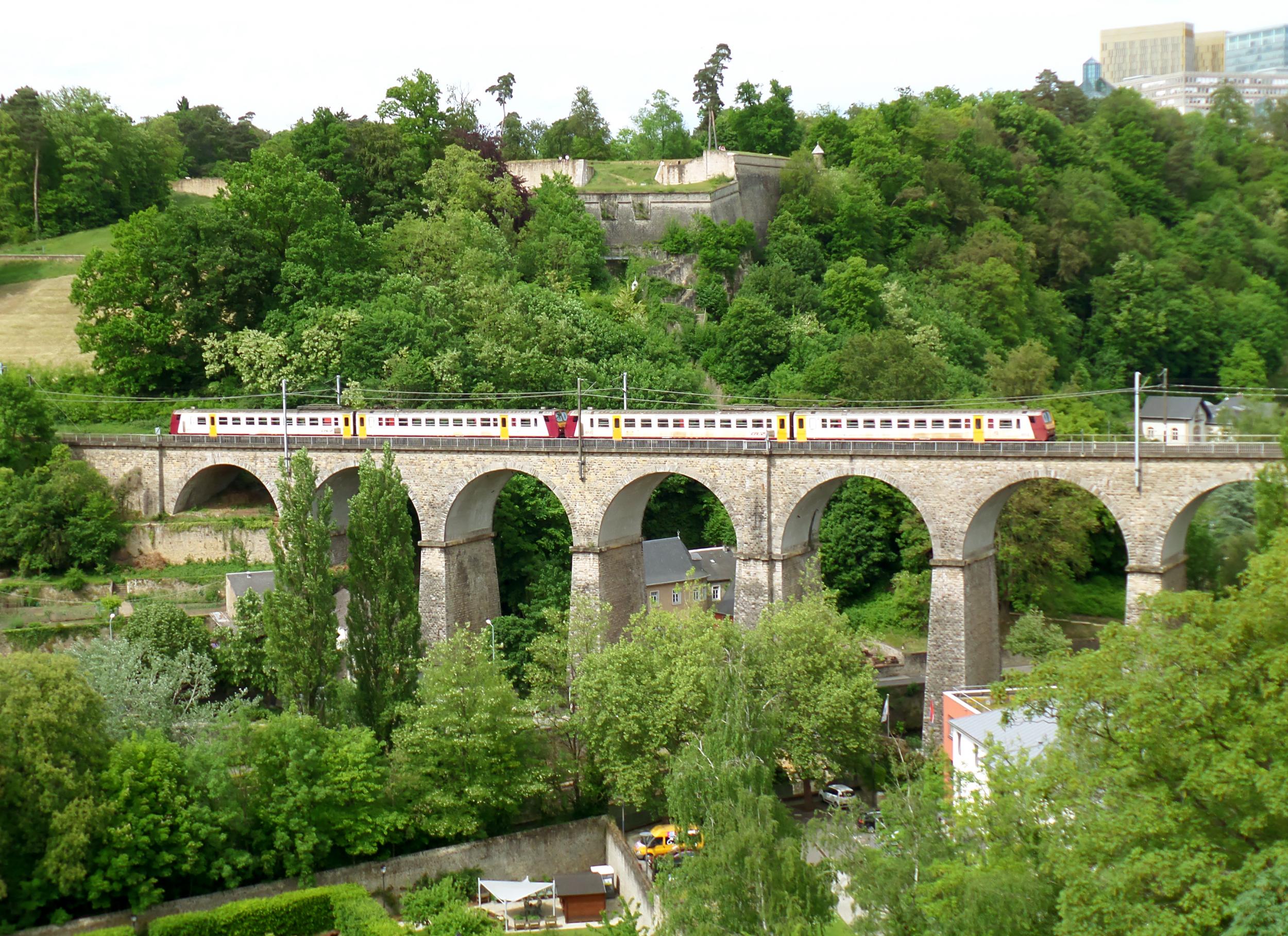 A train crosses a viaduct in Luxembourg City