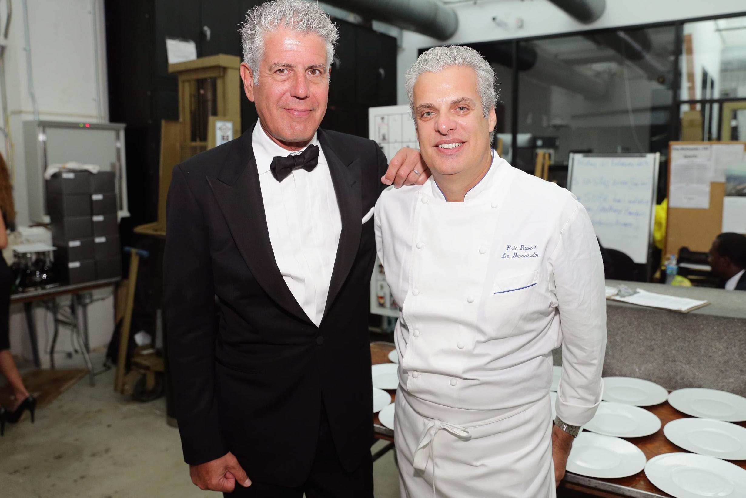 Chefs Anthony Bourdain (left) and Eric Ripert attend Ocean Liner dinner hosted by Anthony Bourdain, Frederic Morin, David McMillan, Andrew Carmellini, Eric Ripert, Daniel Boulud and Francois Payard during the Food Network South Beach Wine &amp; Food Festival at Wolfsonian on 21 February, 2014 in Miami Beach, Florida. (Photo by Neilson Barnard/Getty Images for Food Network SoBe Wine &amp; Food Festival)