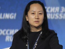Canadian court frees detained Chinese Huawei telecom executive 