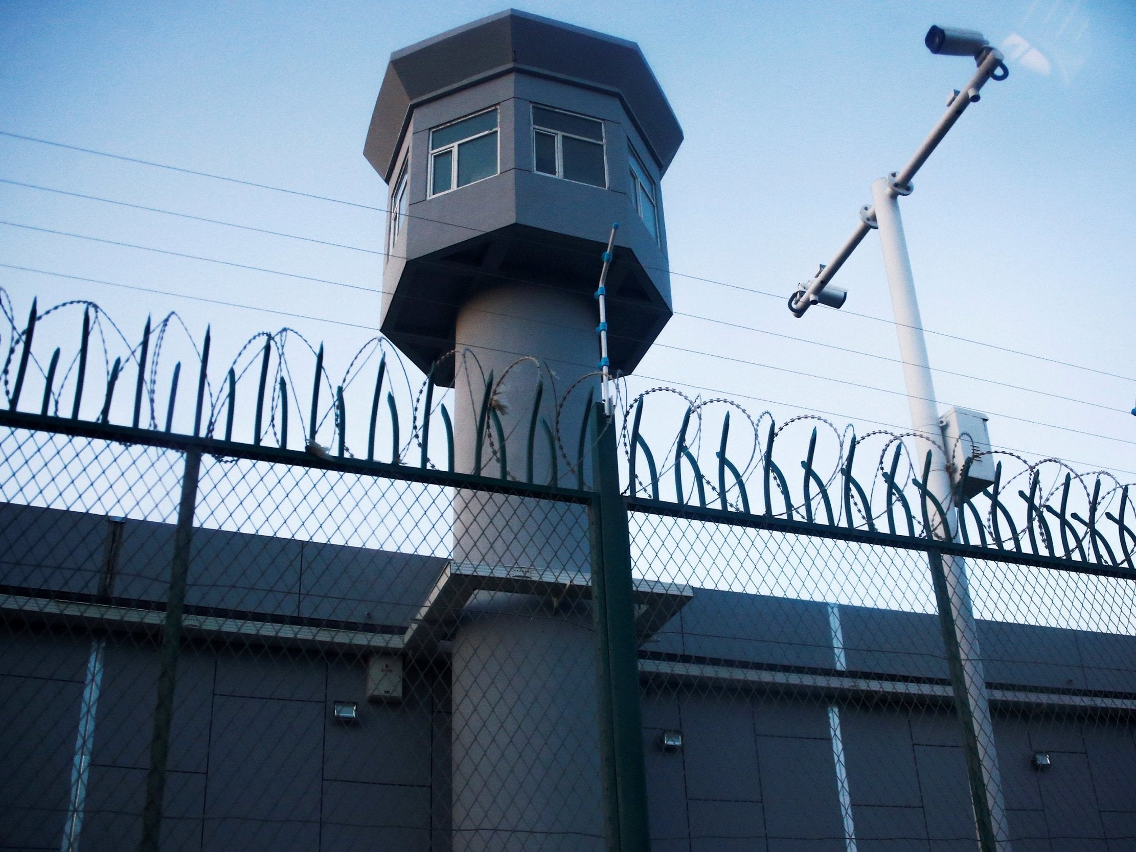 A guard watchtower on a perimeter fence of what is officially known as a vocational skills education centre in Dabancheng in Xinjiang Uighur Autonomous Region, China