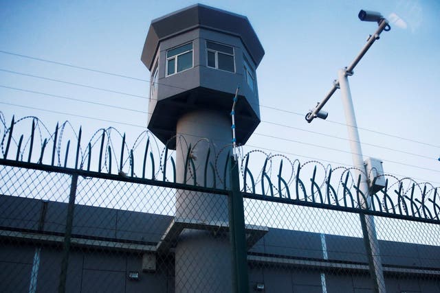 A guard watchtower on a perimeter fence of what is officially known as a vocational skills education centre in Dabancheng in Xinjiang Uighur Autonomous Region, China