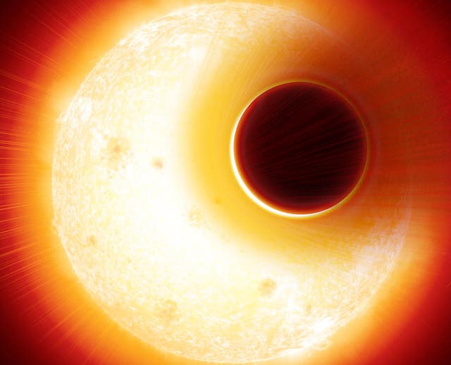 Artist's impression of the exoplanet HAT-P-11b with its extended helium atmosphere blown away by the star, an orange dwarf star smaller, but more active, than the Sun