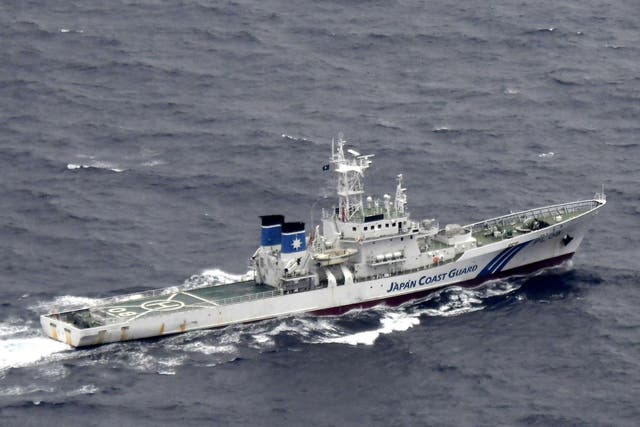 Japan's Coast Guard ship is seen at sea during a search and rescue operation