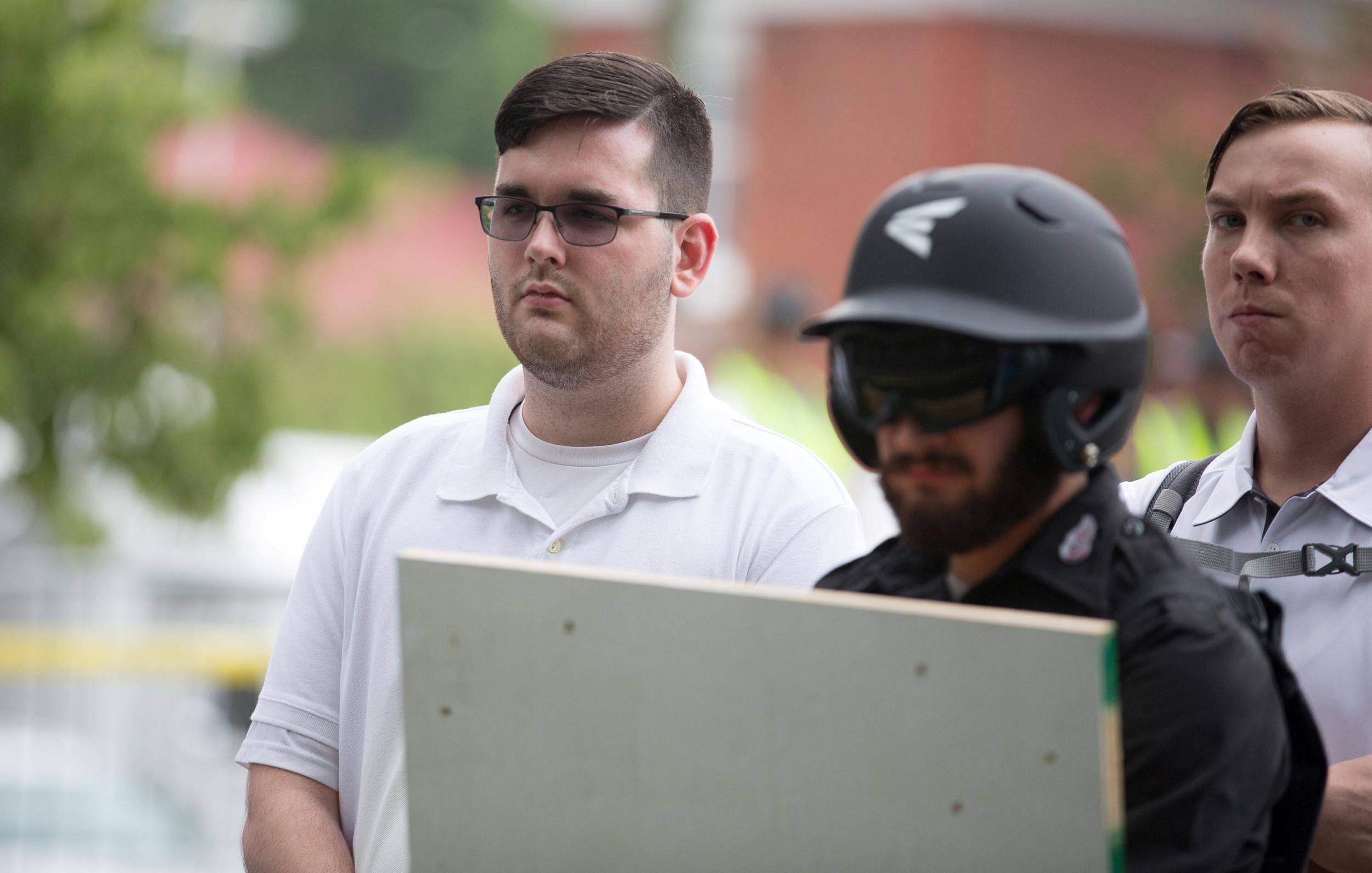 James Alex Fields Jr, (L) seen attending the Unite the Right rally in Charlottesville prior to arrest